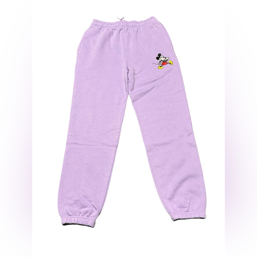 Disney lavender sweatpants with embroidered Mickey on left side. Size XS. NWOT